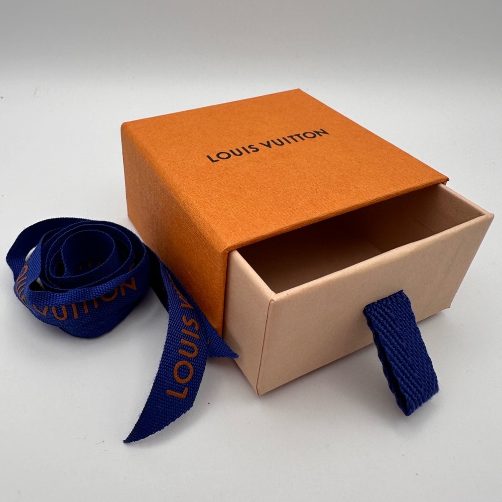Louis Vuitton box and ribbon